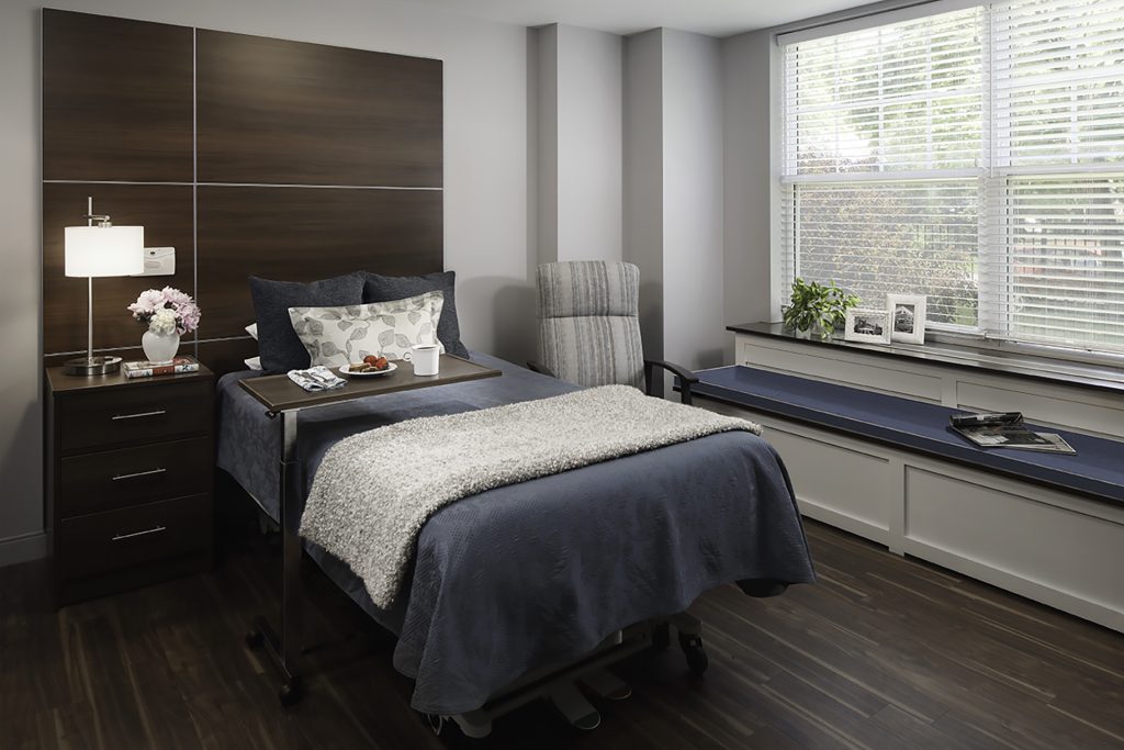Private nursing room with window seat as skilled nursing rightsizing example