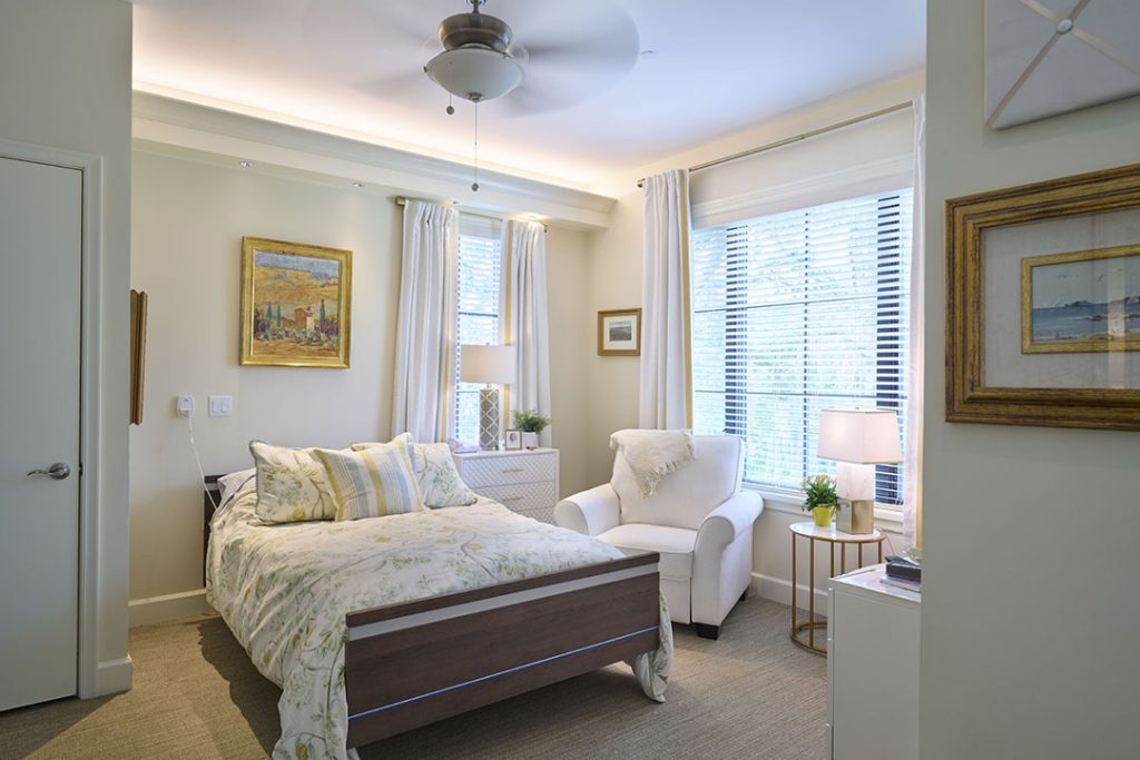 Resident rooms were designed around multiple large-scale windows keeping the interior sunny and featuring views of old growth oak trees. 