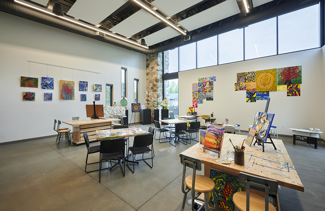 Instead of a variety of activities happening in a single space, areas such as the visual art studio are purpose-built so participants move through a variety of spaces throughout their day.