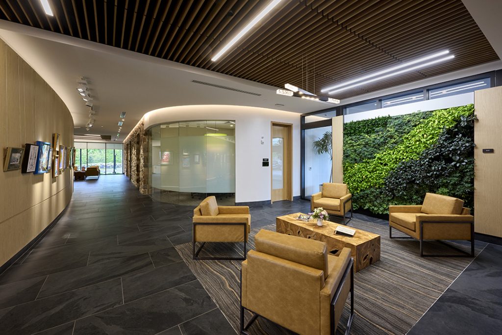 LiveWell dementia positive community lobby with green wall and art gallery