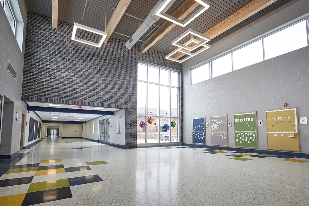 Loganville-Springfield Elementary School Lobby showing wide hallways and bulletin boards