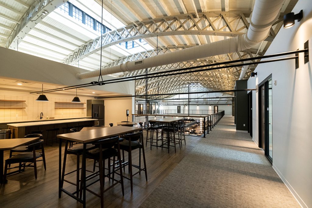 The communal kitchen offers both functional amenities as well as a space to network and relax.