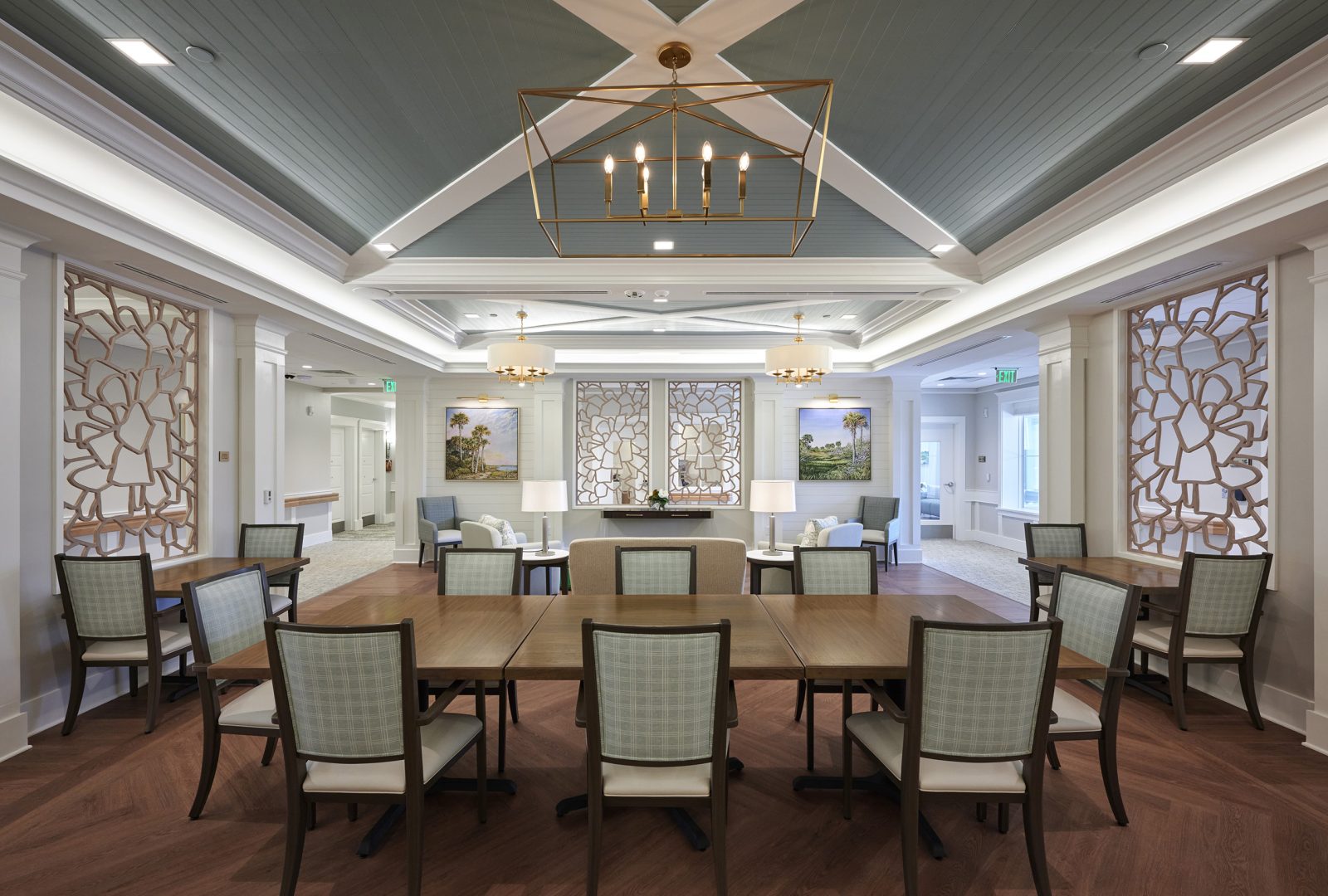 dining table and living room in community memory care at Vicars Landing