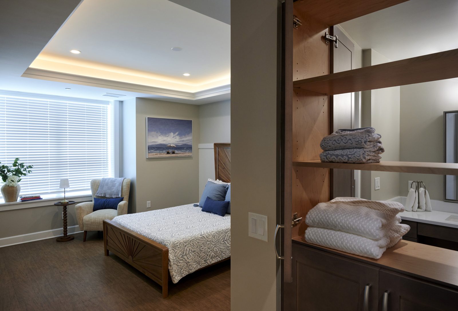 Pass-through cabinet in memory care resident room