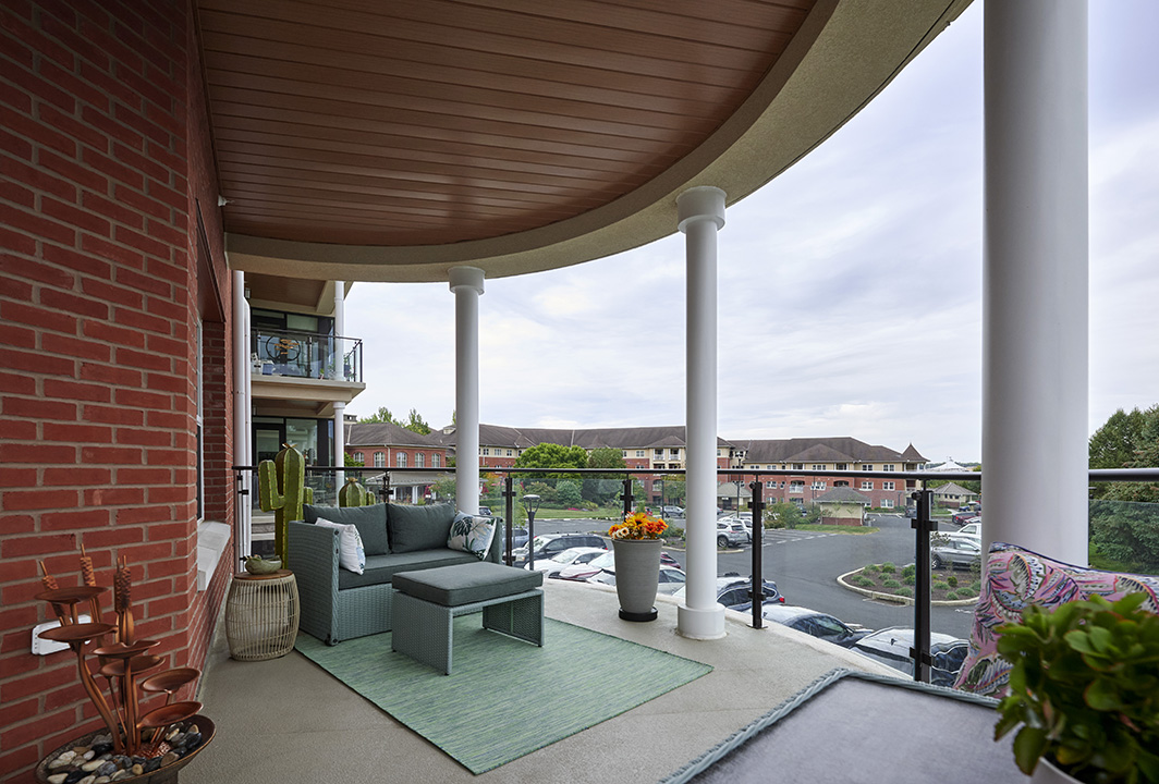 Each residence boasts either a private balcony or patio and glass railings for an unobstructed view.