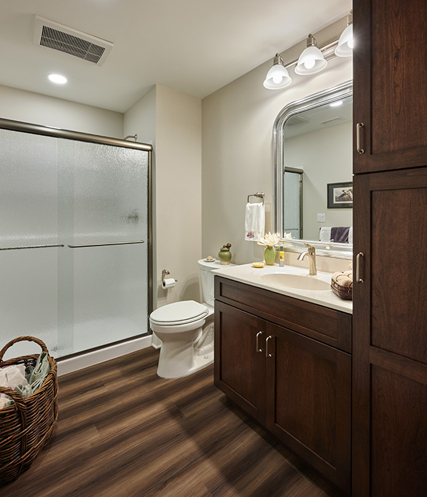 Bathrooms with low-threshold showers are adaptable to allow residents to age in place longer. 