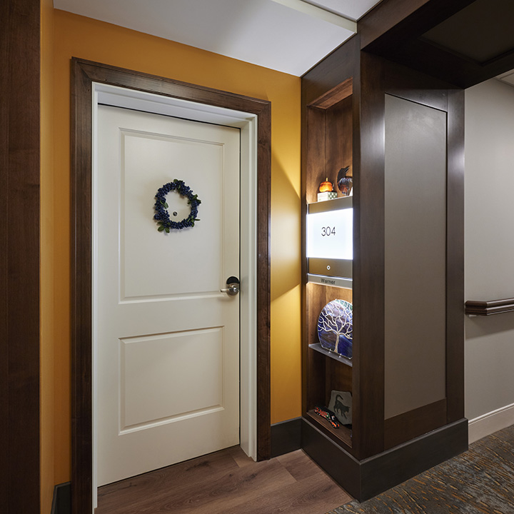 The front entry to each residence is highlighted with shelving for personalization.