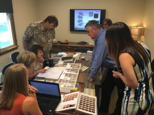 Client meeting reviewing interior samples