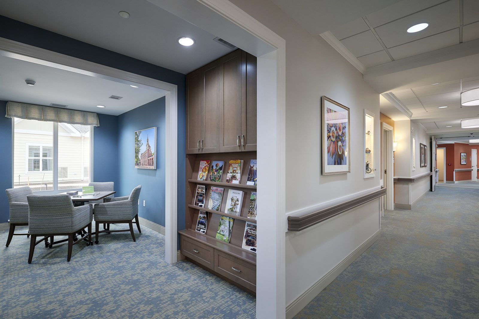 Small activity room and magazine nook located along a memory support corridor