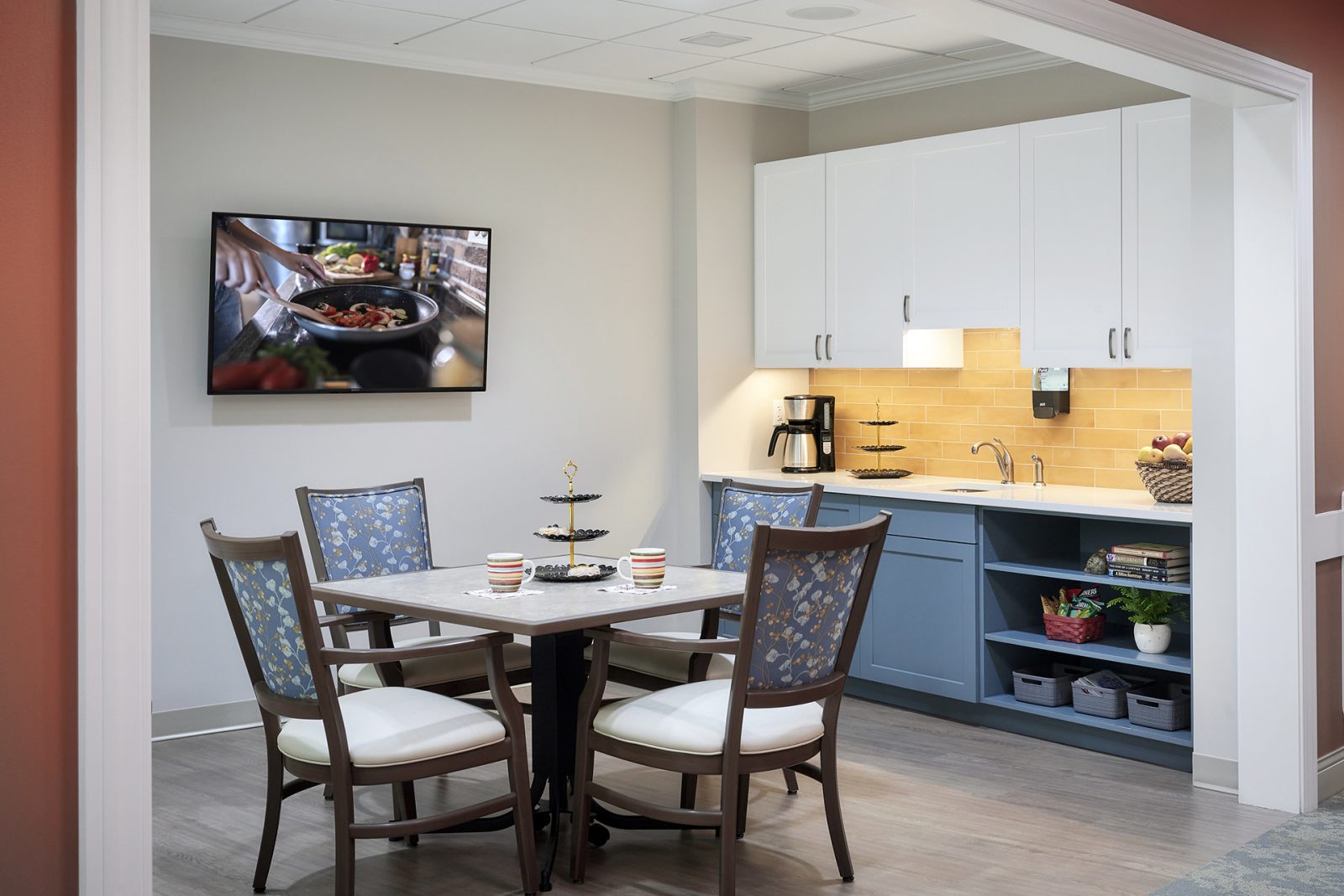 Activity nook in memory care neighborhood with serving counter to support diverse activities