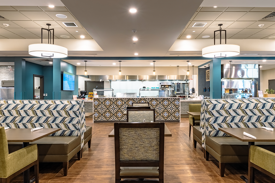 Cafe booths looking toward open kitchen