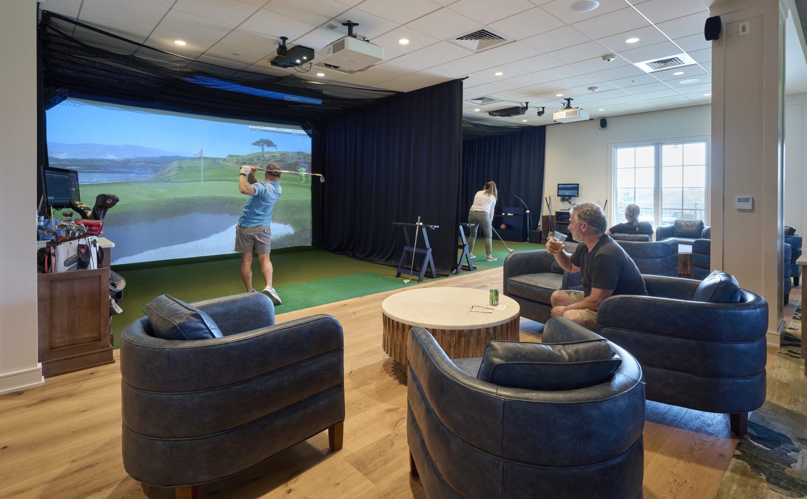 indoor golf simulator with lounge seating