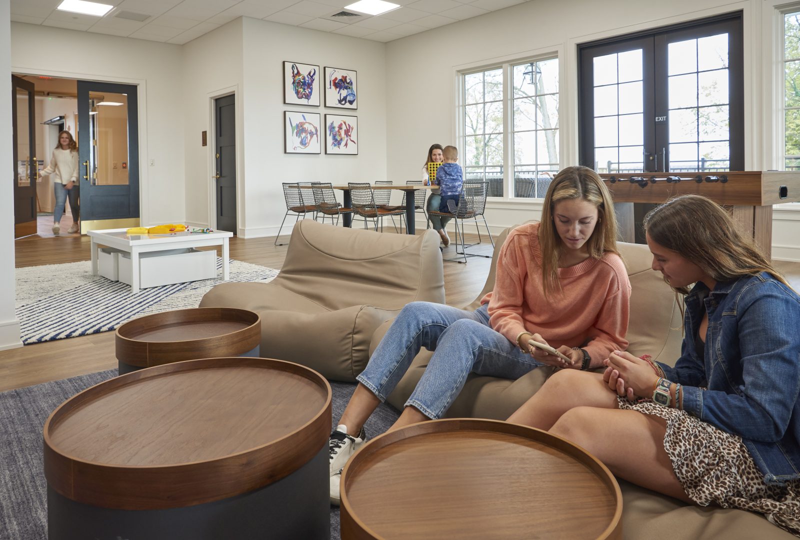 children and teen lounge with game table in background