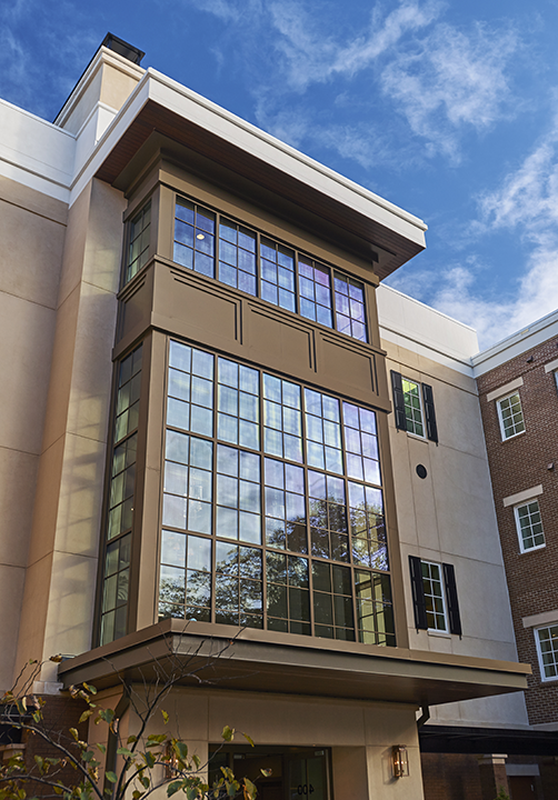 detail of exterior of Quay hybrid with large windows