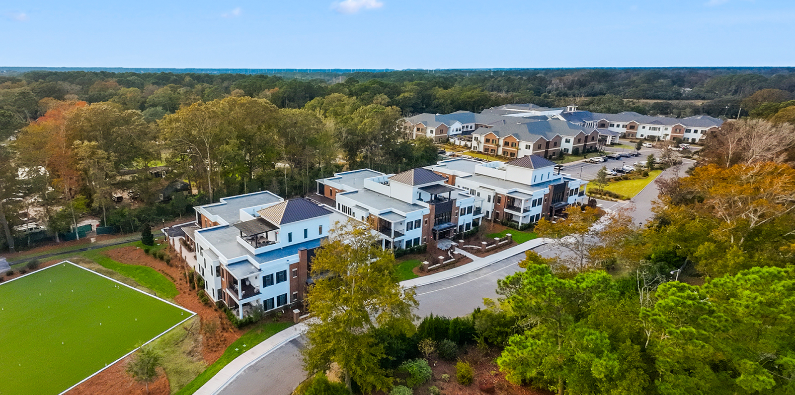 aerial view of three Meade mini hybrid homes